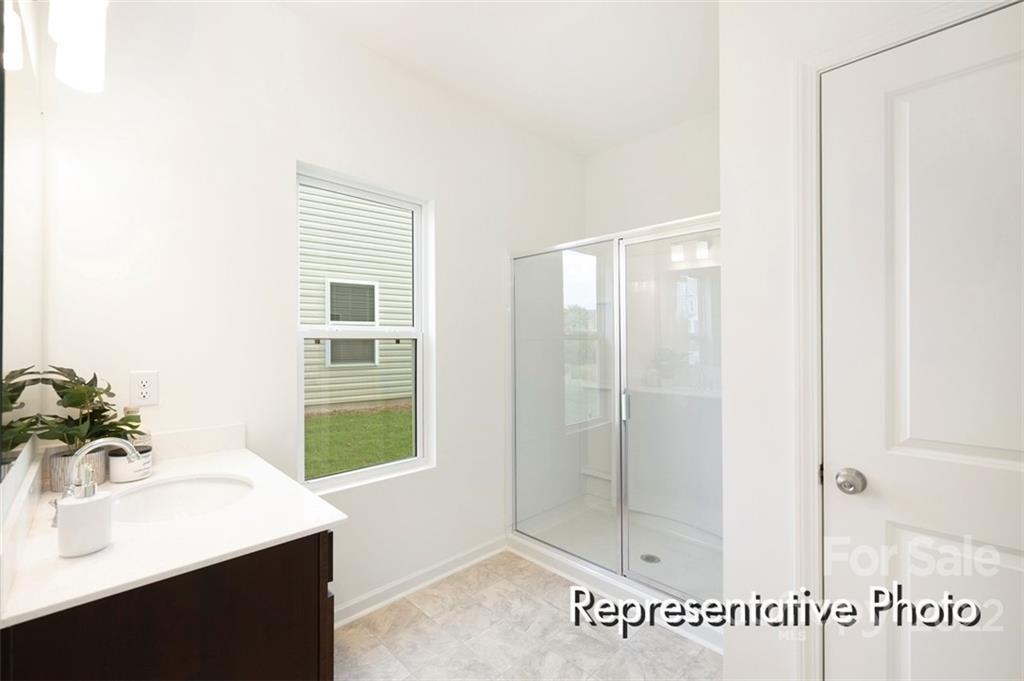 321 Copes Court, Unit 48 Kannapolis, NC 28081 - Photo 18 of 18 a bathroom with a sink and a mirror