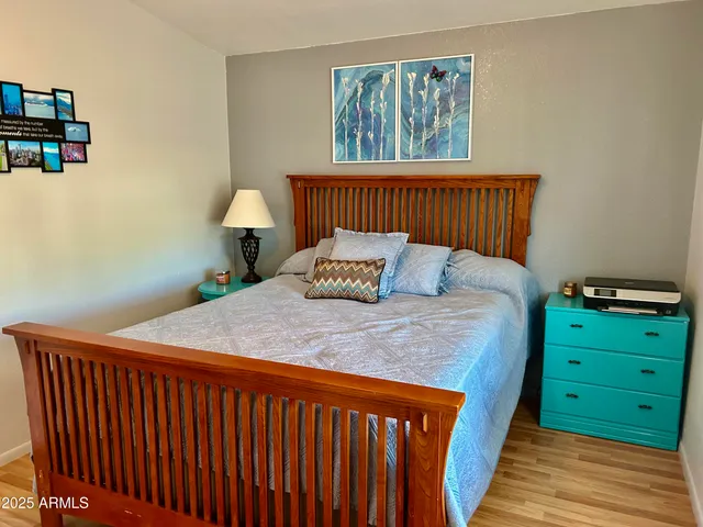 a bathroom with a toilet sink and shower
