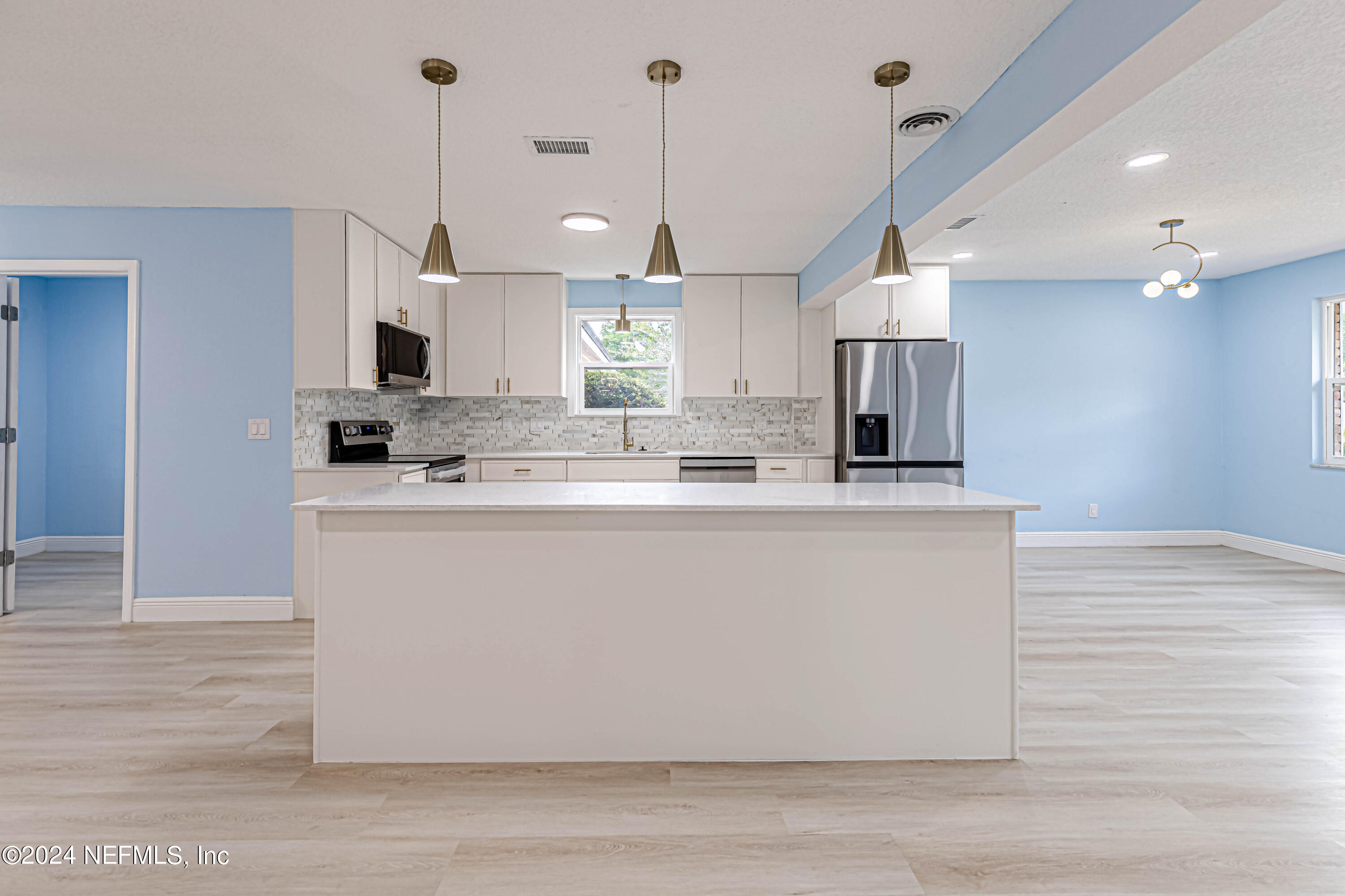 7557 Holiday Road South Jacksonville, FL 32216 - Photo 13 of 47 Kitchen Island