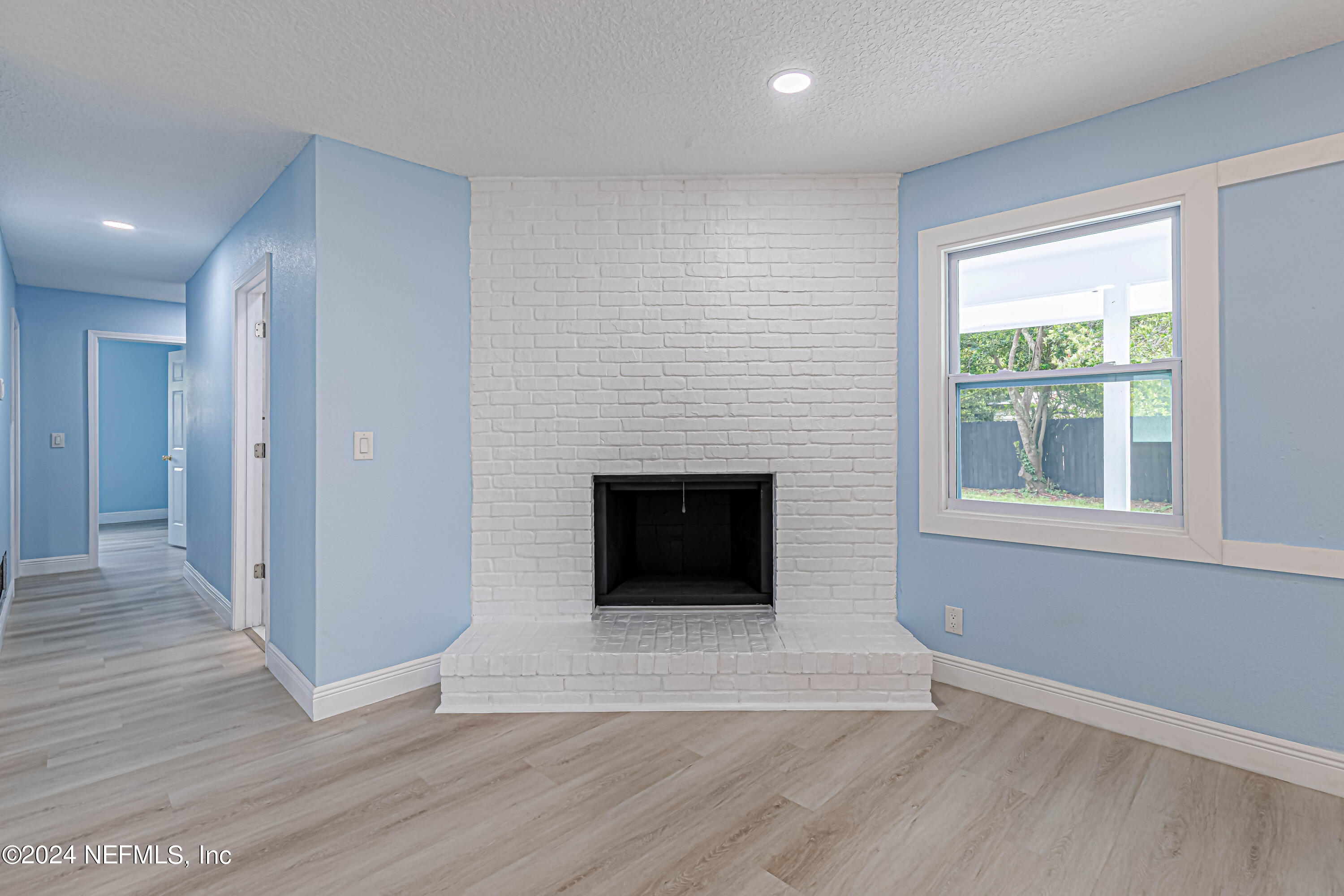 7557 Holiday Road South Jacksonville, FL 32216 - Photo 21 of 47 Family Room Fireplace
