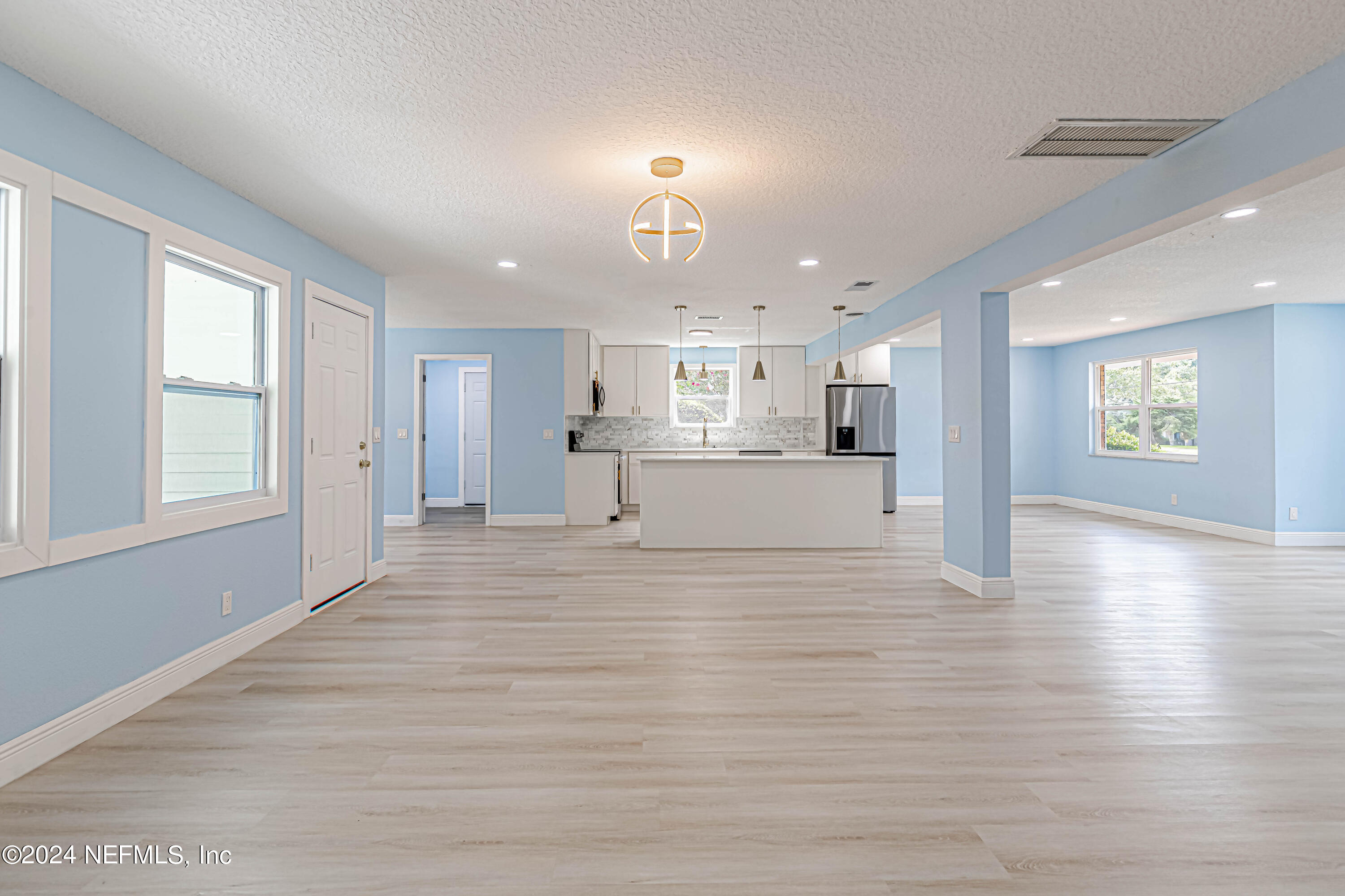 7557 Holiday Road South Jacksonville, FL 32216 - Photo 22 of 47 Family Room to Kitchen