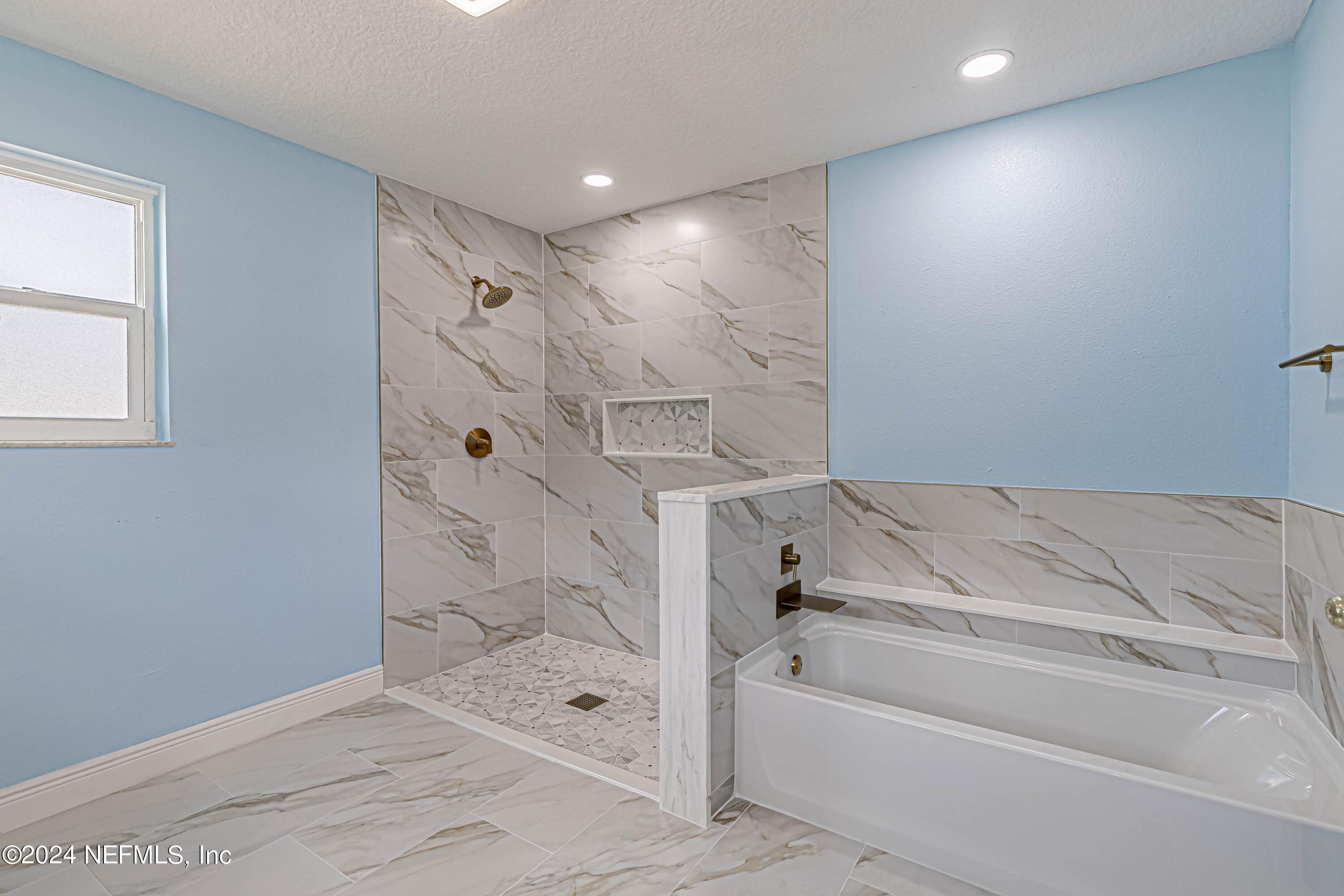 7557 Holiday Road South Jacksonville, FL 32216 - Photo 30 of 47 Primary Bath Shower & Soaking Tub