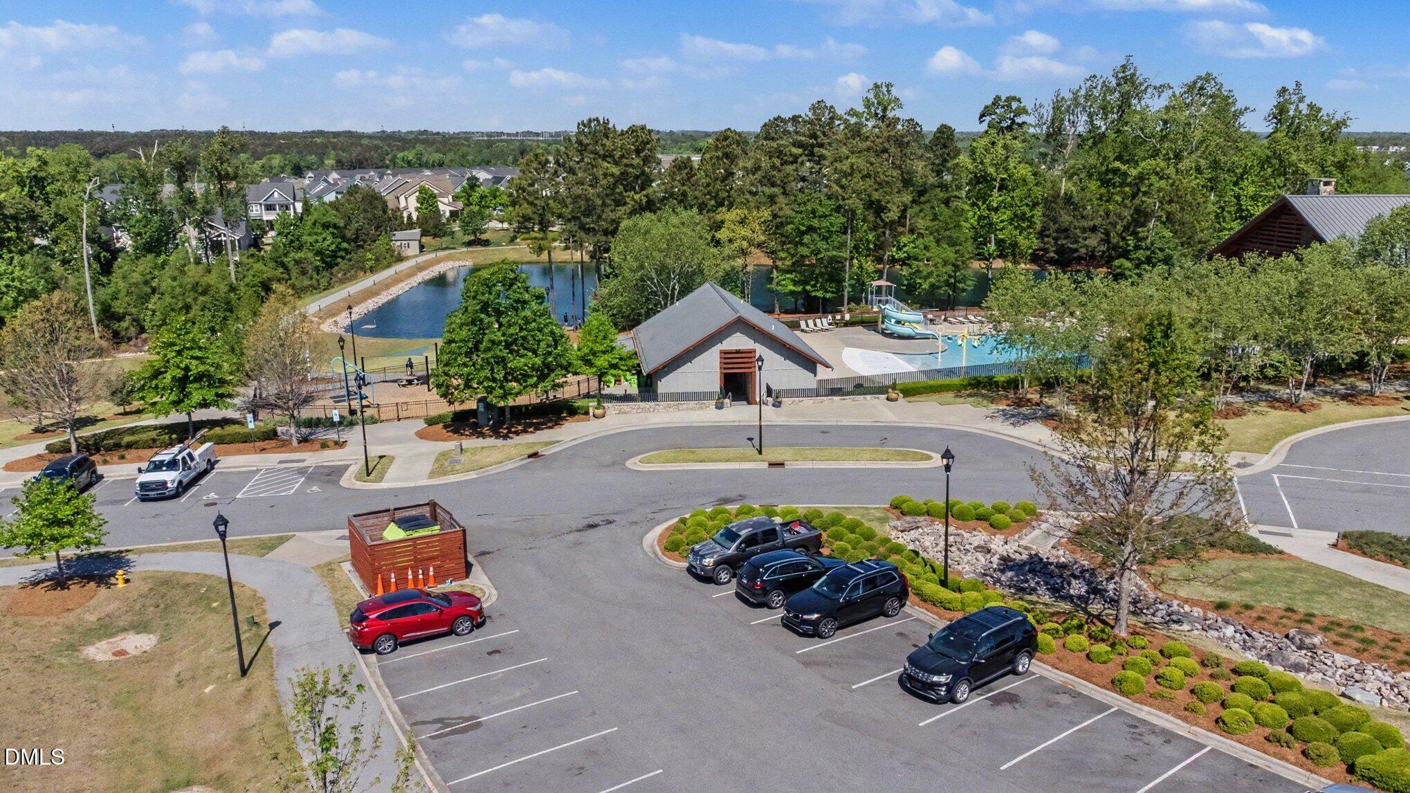 315 Cook Street Wendell, NC 27591 - Photo 21 of 22 an aerial view of a house with garden space and a car park in front of the house