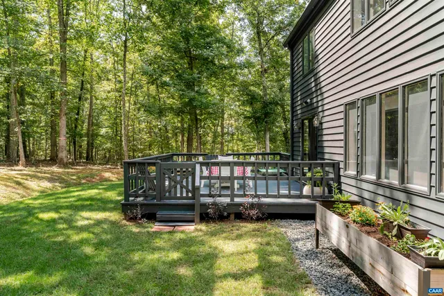 a view of a chairs and table on the wooden floor