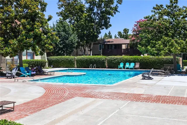 a view of a park with chairs