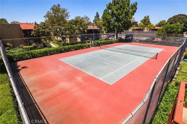 a view of a backyard with sitting area