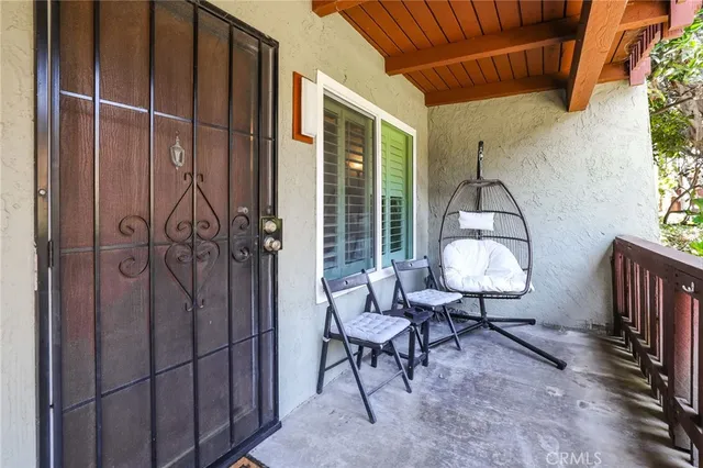 a view of a livingroom with furniture and door