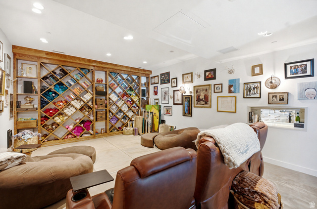 5971 Maple Ridge Trail Oakley, UT 84055 - Photo 33 of 43 Spacious room featuring a custom built-in wooden shelving unit, recessed lighting, and light-toned flooring