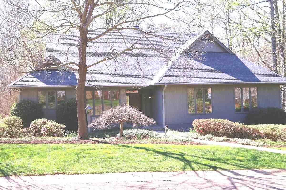8800 Old Tom Way Raleigh, NC 27613 - Photo 1 of 25 a front view of a house with garden