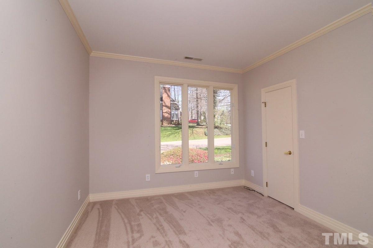 8800 Old Tom Way Raleigh, NC 27613 - Photo 12 of 25 an empty room with windows
