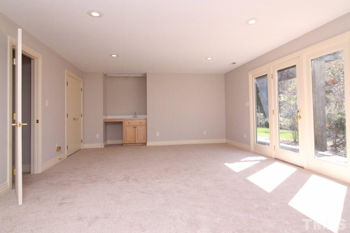 8800 Old Tom Way Raleigh, NC 27613 - Photo 14 of 25 a view of an empty room with a window