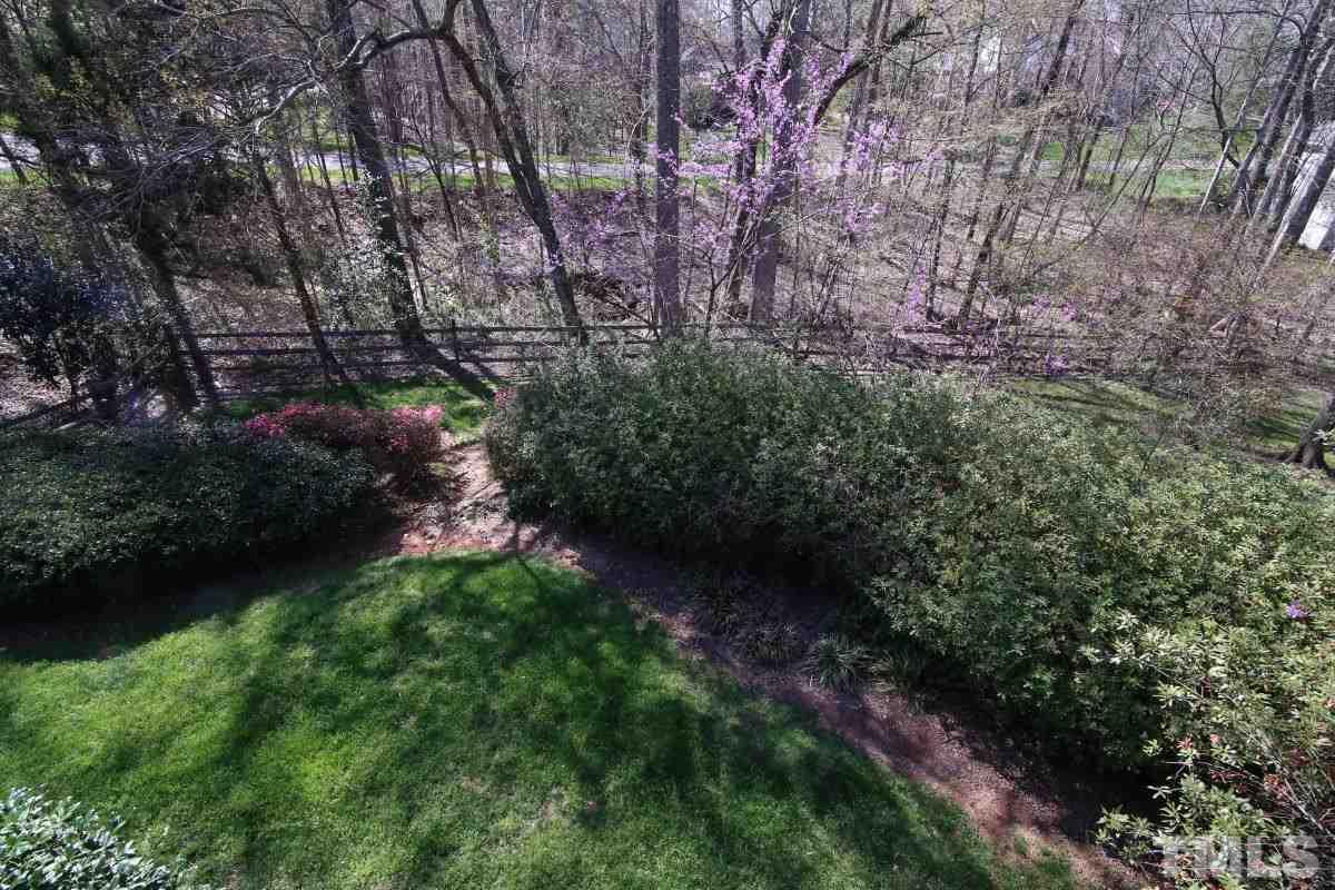 8800 Old Tom Way Raleigh, NC 27613 - Photo 16 of 25 a view of a garden with plants and trees