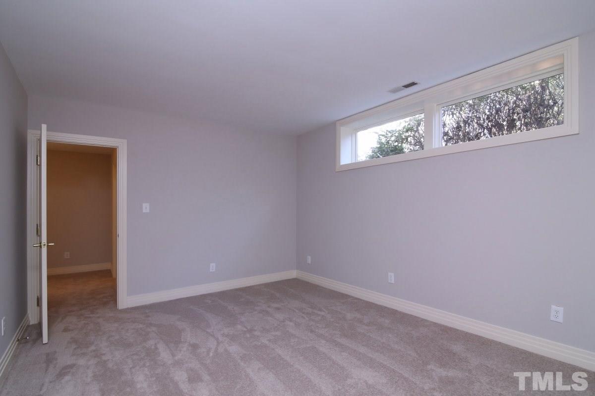 8800 Old Tom Way Raleigh, NC 27613 - Photo 18 of 25 a view of empty room