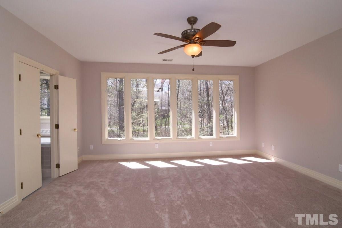 8800 Old Tom Way Raleigh, NC 27613 - Photo 8 of 25 a view of an empty room with a window