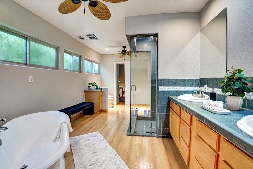 14955 Haynes Street Van Nuys, CA 91411 - Photo 19 of 35 a kitchen with a refrigerator and a sink