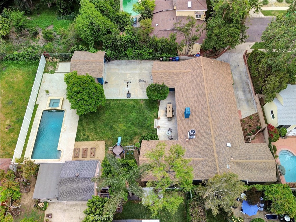 14955 Haynes Street Van Nuys, CA 91411 - Photo 34 of 35 an aerial view of a house with a yard and pool