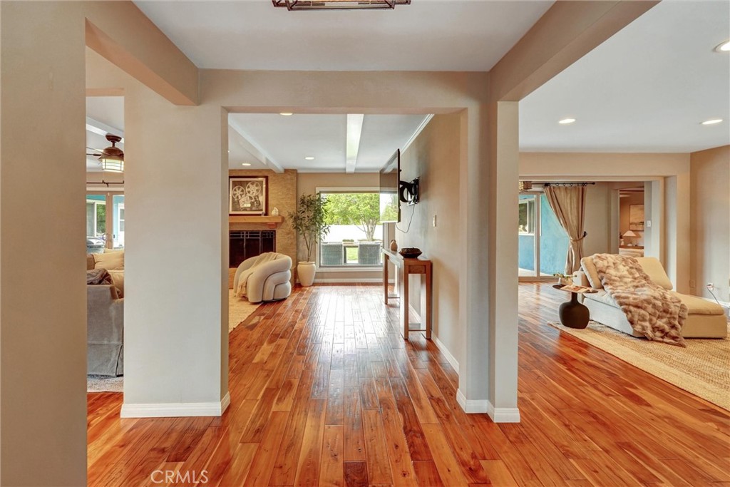 14955 Haynes Street Van Nuys, CA 91411 - Photo 6 of 35 a living room with furniture and wooden floor