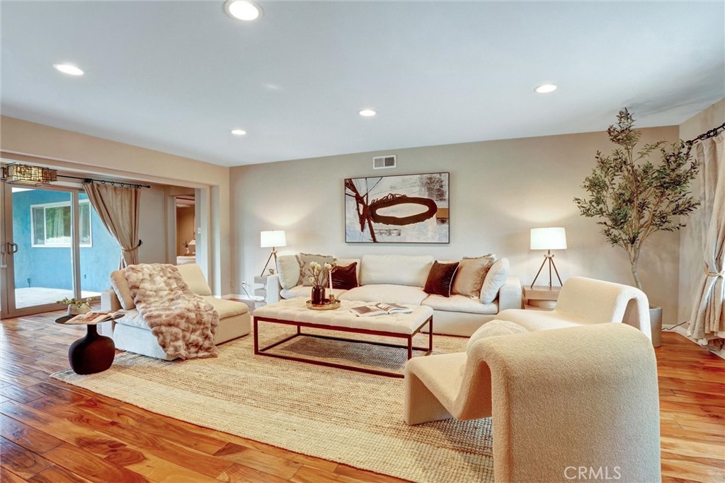 14955 Haynes Street Van Nuys, CA 91411 - Photo 9 of 35 a bedroom with furniture and a large window