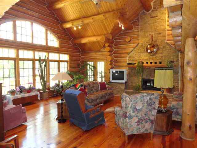 1373 South Snipe Hollow Road Elizabeth, IL 61028 - Photo 4 of 12 a living room with furniture and a large window