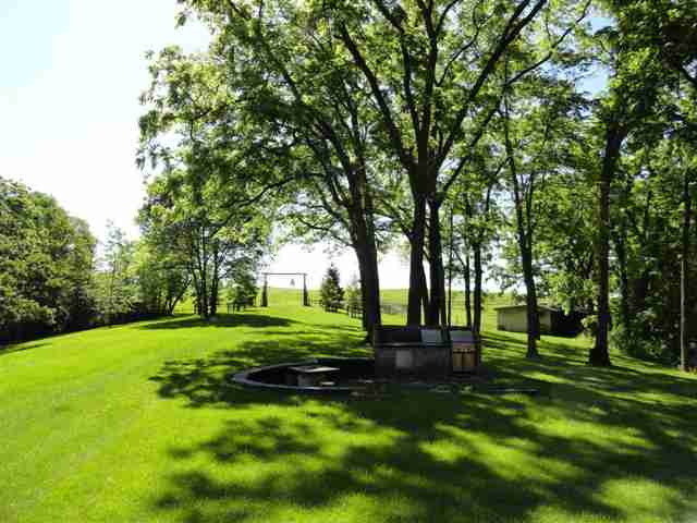 1373 South Snipe Hollow Road Elizabeth, IL 61028 - Photo 10 of 12 a view of a park with trees in the background