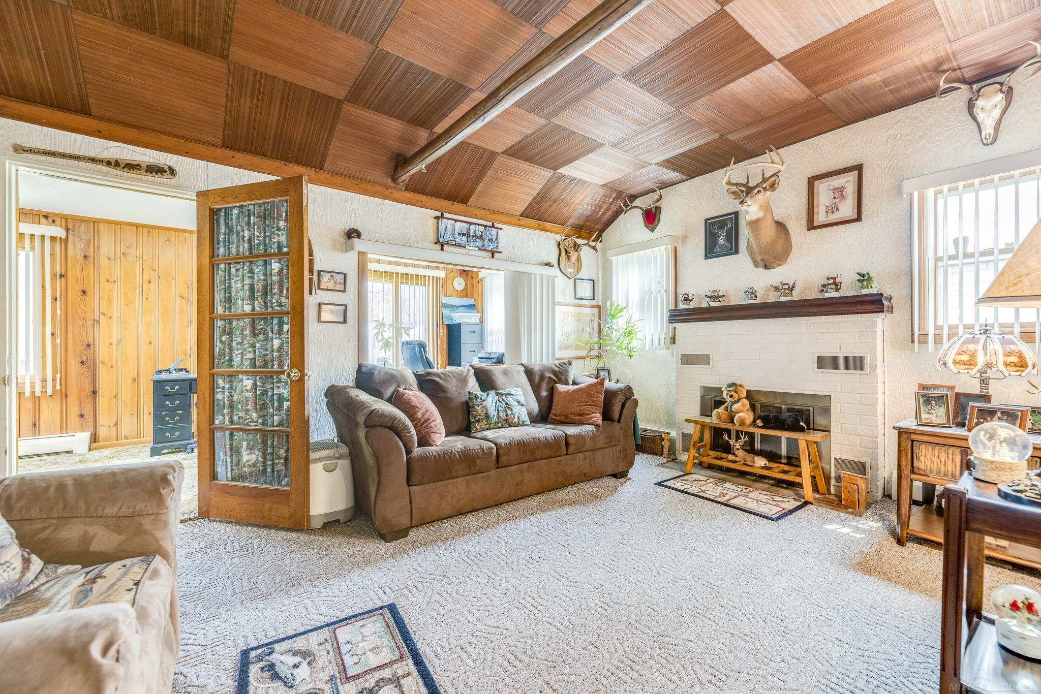 7293 Vine Road Lexington, MI 48450 - Photo 28 of 62 Cozy Family Room 12'x16'