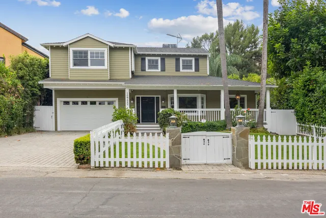 front view of a house with a small yard