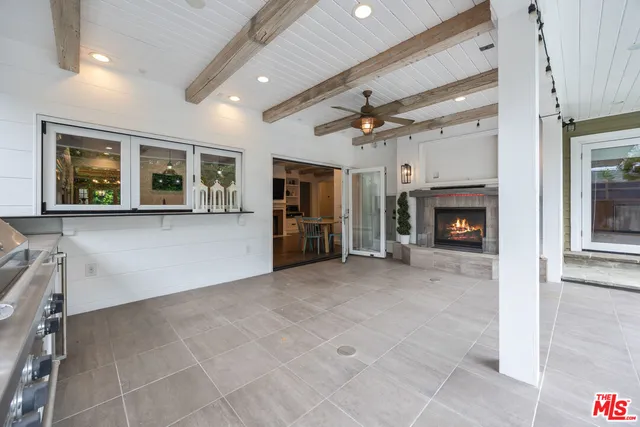 a outdoor living space with patio furniture and potted plants
