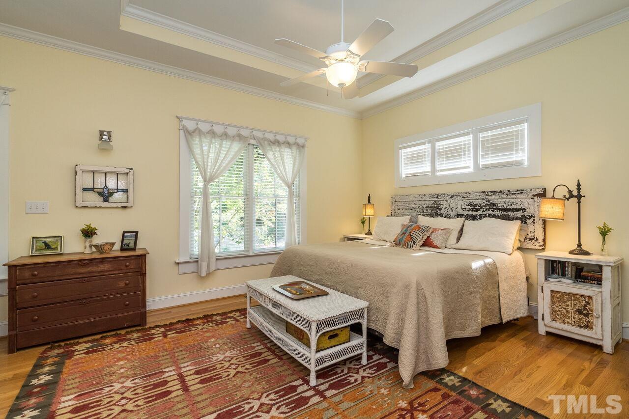 1218 Filmore Street Raleigh, NC 27605 - Photo 18 of 38 a bedroom with a bed and a window