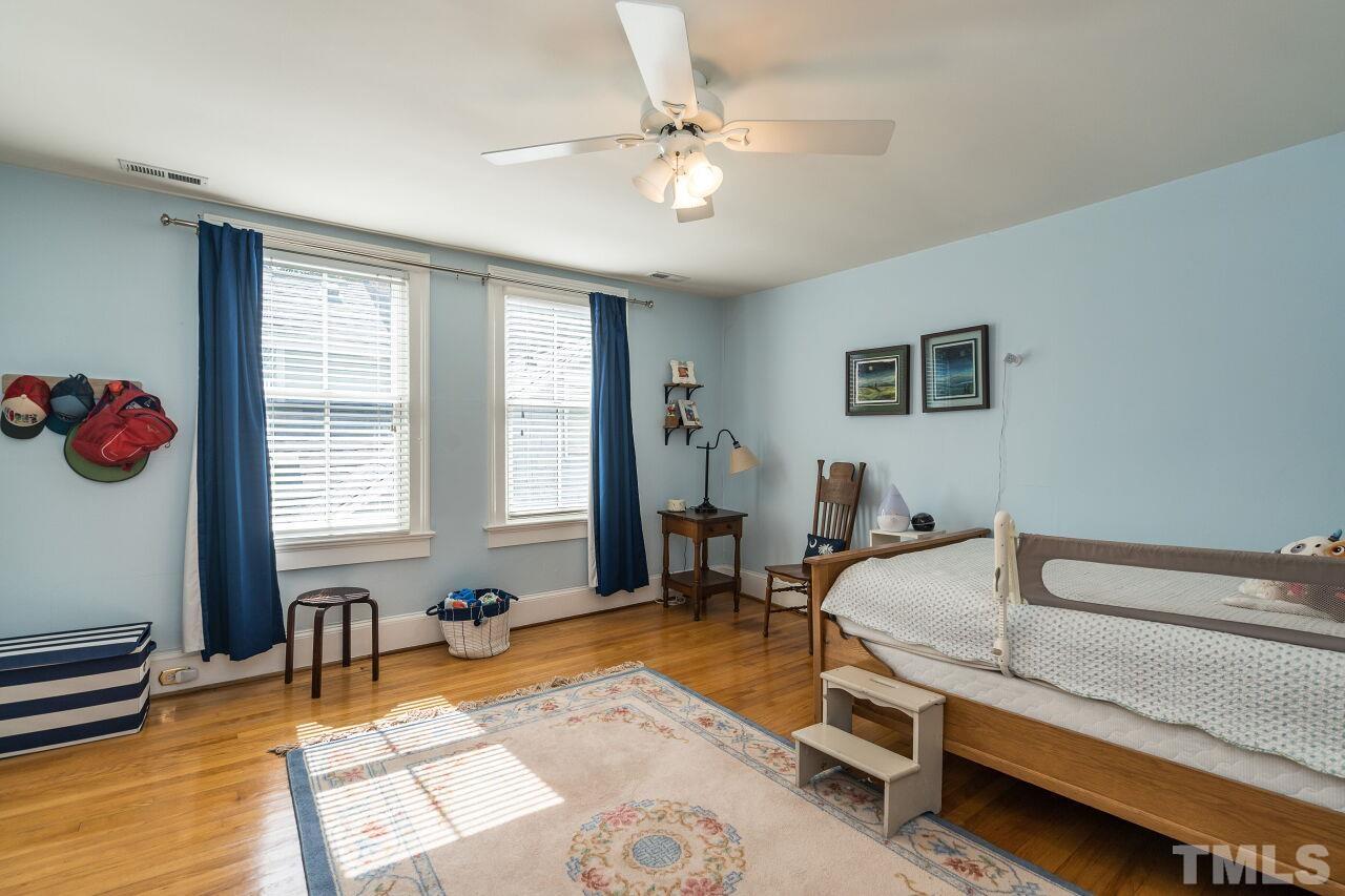 1218 Filmore Street Raleigh, NC 27605 - Photo 28 of 38 a bedroom with furniture and a window