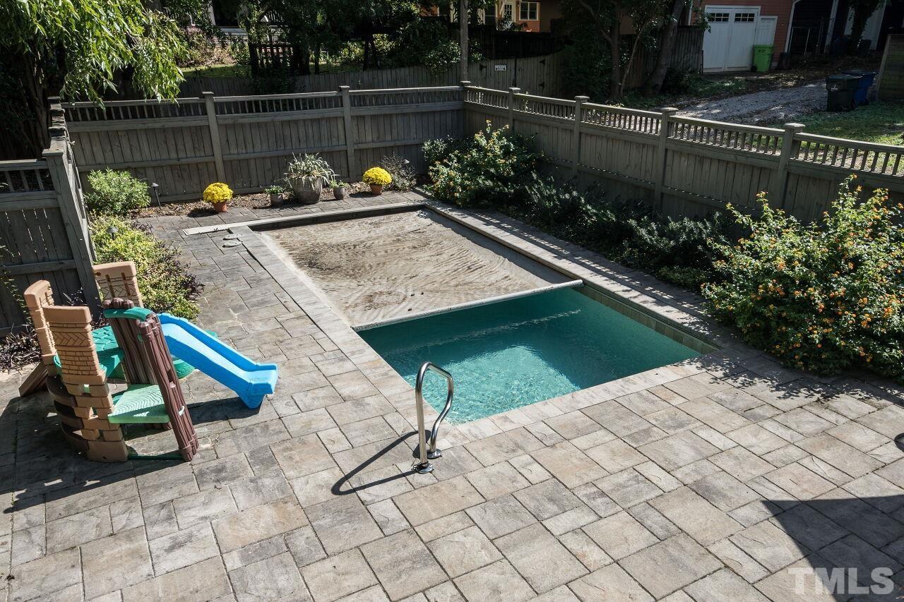 1218 Filmore Street Raleigh, NC 27605 - Photo 33 of 38 a view of swimming pool with a lounge chairs in patio