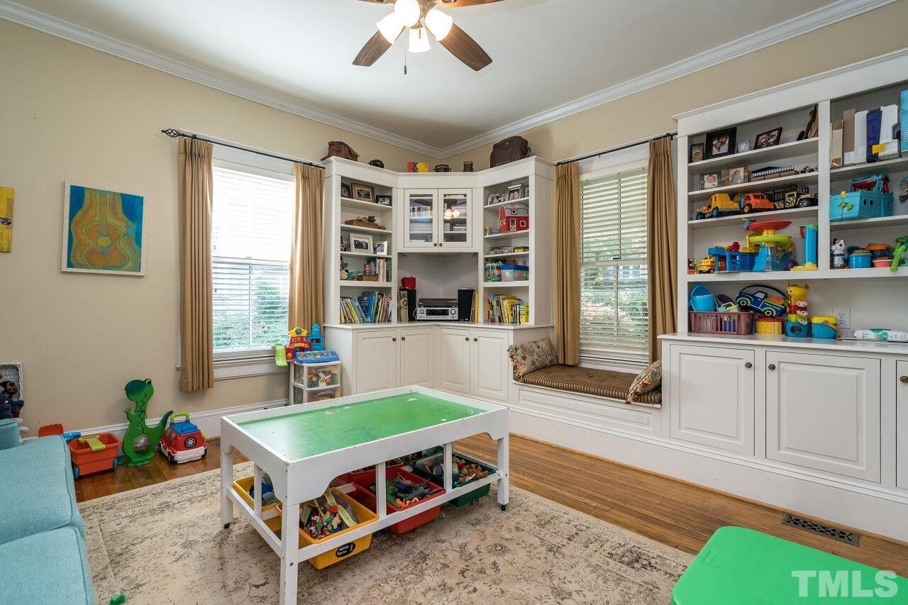 1218 Filmore Street Raleigh, NC 27605 - Photo 6 of 38 a room with pool table and windows