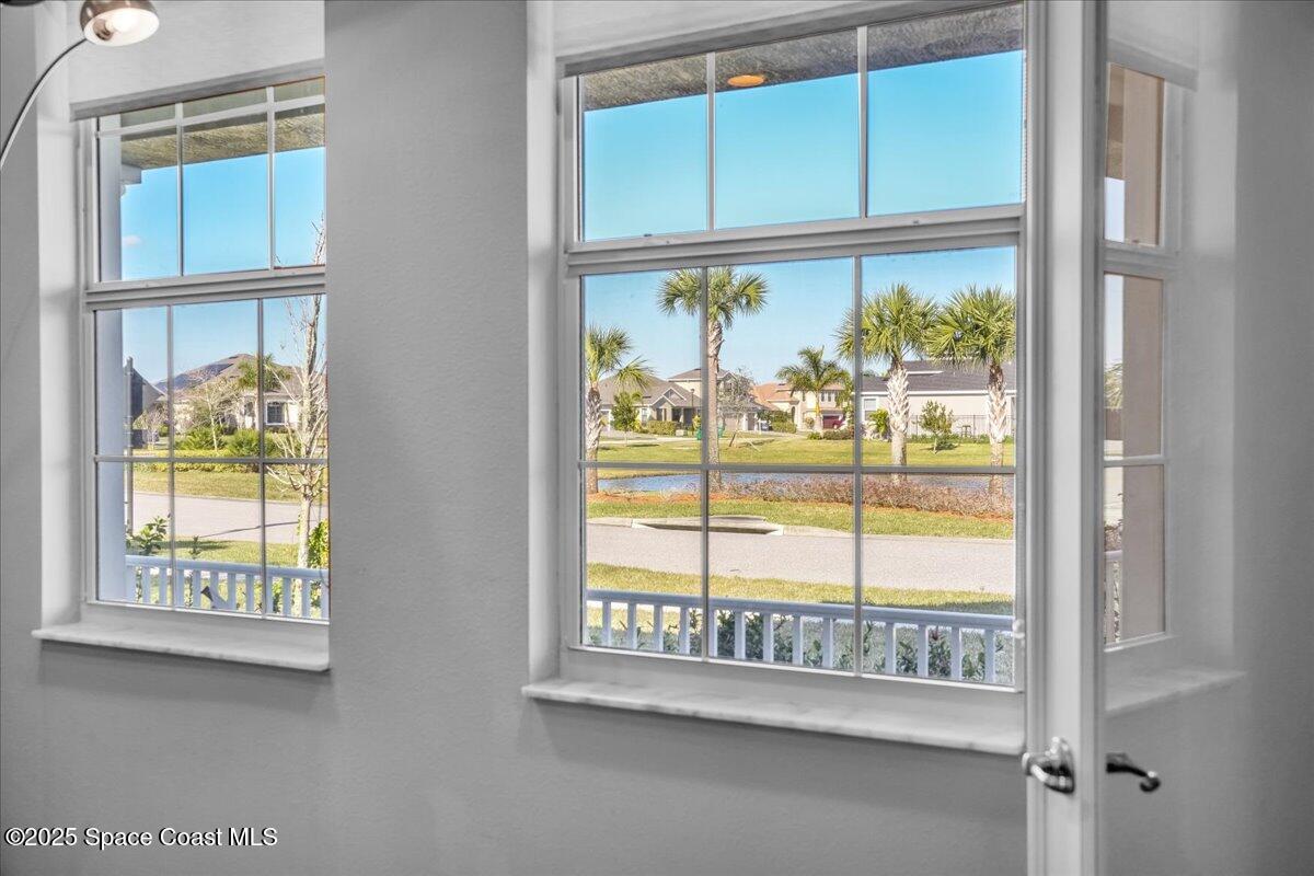 3379 Ribbon Grass Drive Melbourne, FL 32940 - Photo 18 of 62 a view of an empty room with a window