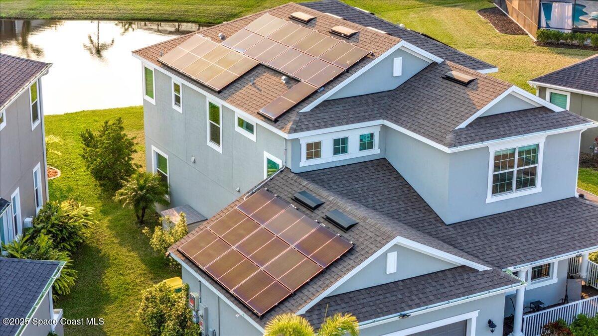 3379 Ribbon Grass Drive Melbourne, FL 32940 - Photo 4 of 62 an aerial view of a house with a yard