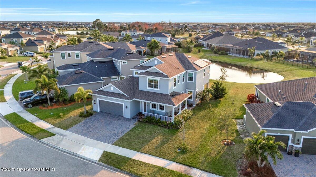 3379 Ribbon Grass Drive Melbourne, FL 32940 - Photo 49 of 62 an aerial view of residential houses with outdoor space