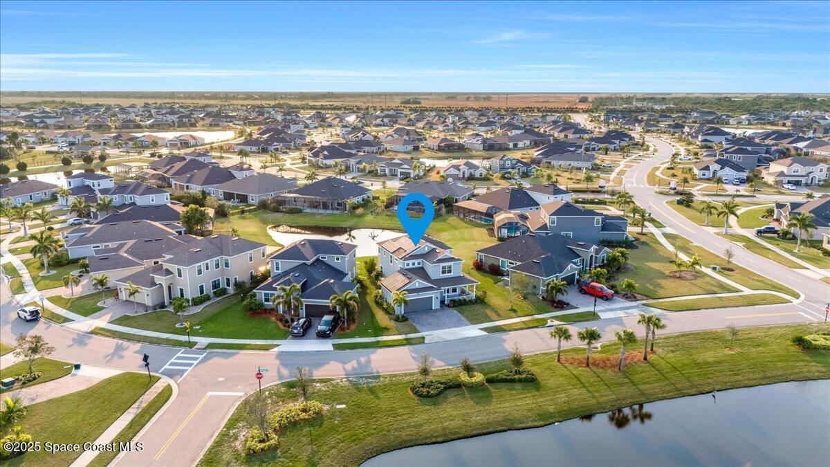 3379 Ribbon Grass Drive Melbourne, FL 32940 - Photo 50 of 62 an aerial view of residential houses with outdoor space