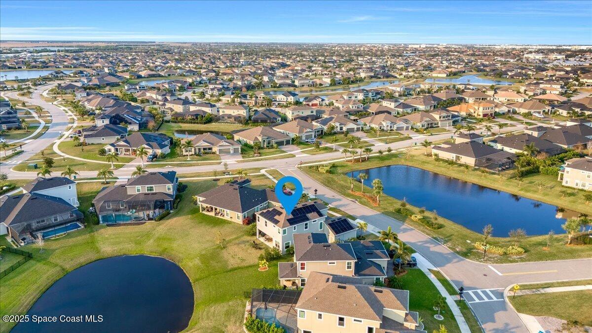 3379 Ribbon Grass Drive Melbourne, FL 32940 - Photo 51 of 62 an aerial view of residential houses with outdoor space