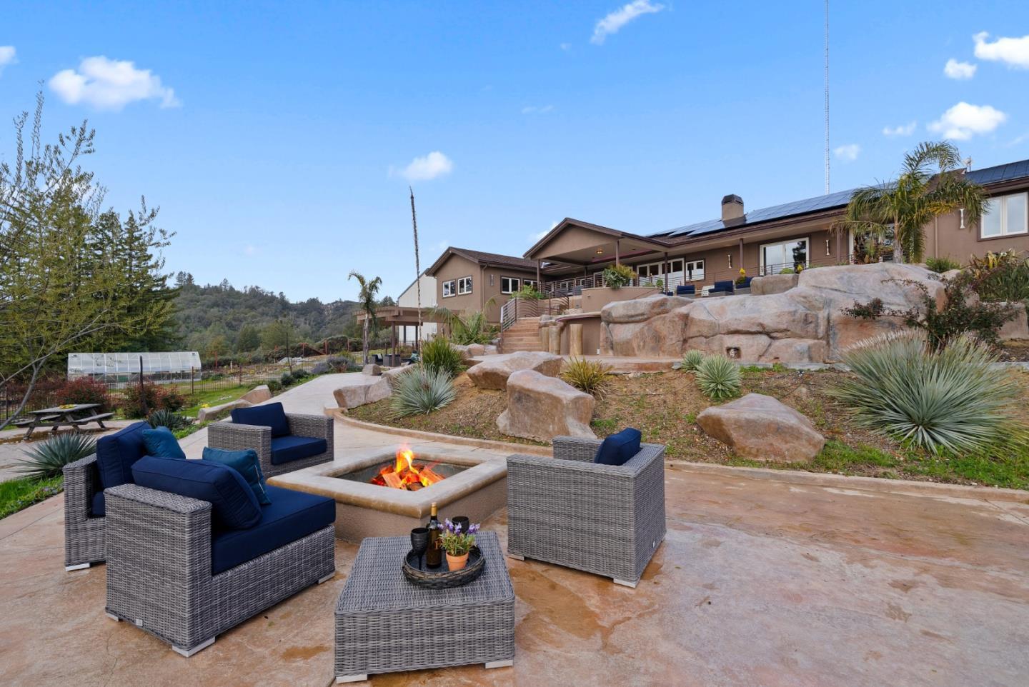 1061 Summit Road Watsonville, CA 95076 - Photo 56 of 83 a view of a terrace with couches and potted plants