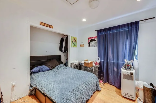 a bed room with a bed and a couch