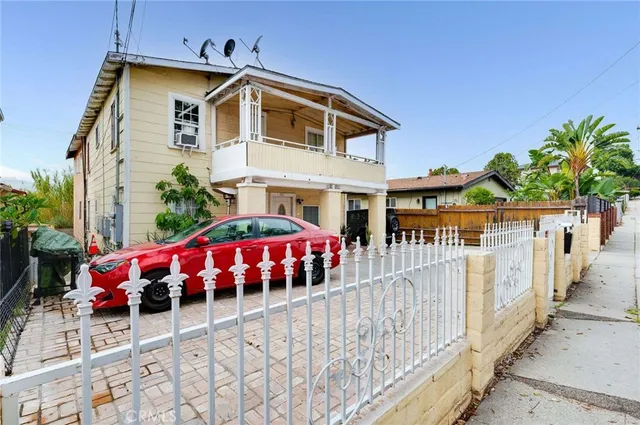 a front view of a house with balcony