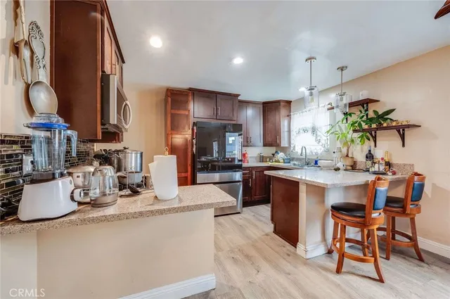 a kitchen with kitchen island granite countertop lots of counter top space