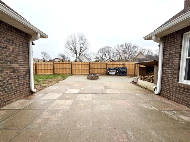 a view of a car parked in front of house