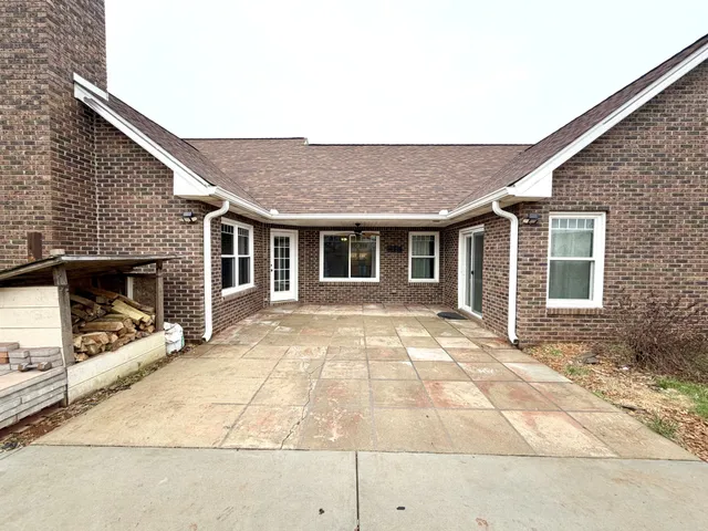 a front view of a house with yard