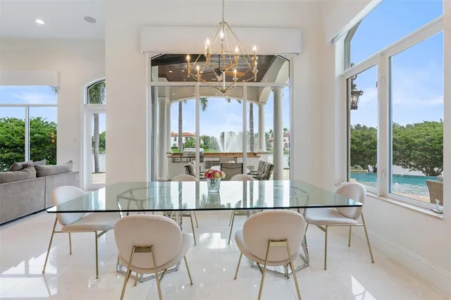 a bedroom with a bed and a couch with window