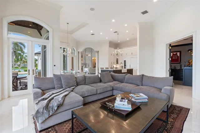 a bed room with a bed and a chair