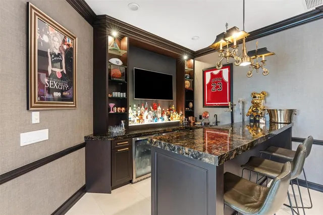 a bath tub sitting next to a white sink