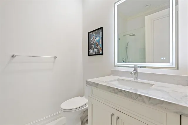 a living room with fireplace furniture and large windows