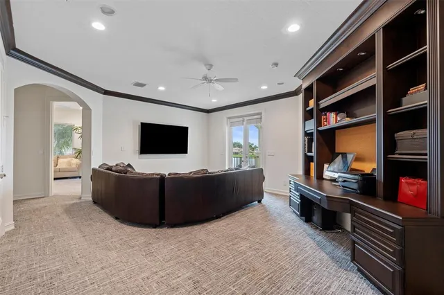 an aerial view of a house with a lake view