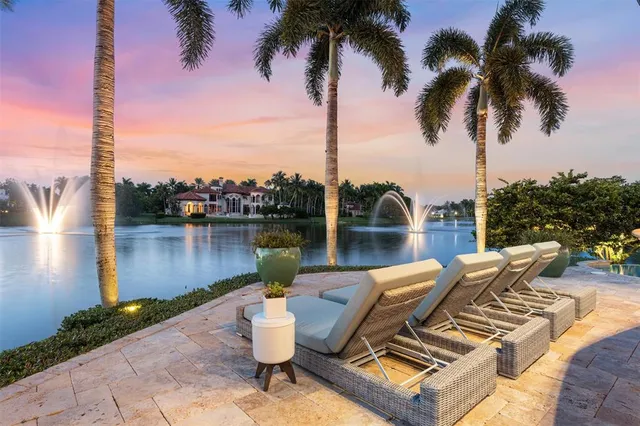 a view of a chairs and tables in the patio