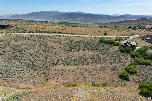 3508 Ridgeway Drive, Unit 31 Heber City, UT 84036 - Photo 8 of 13 Expansive undeveloped lot featuring natural vegetation and distant mountain ranges