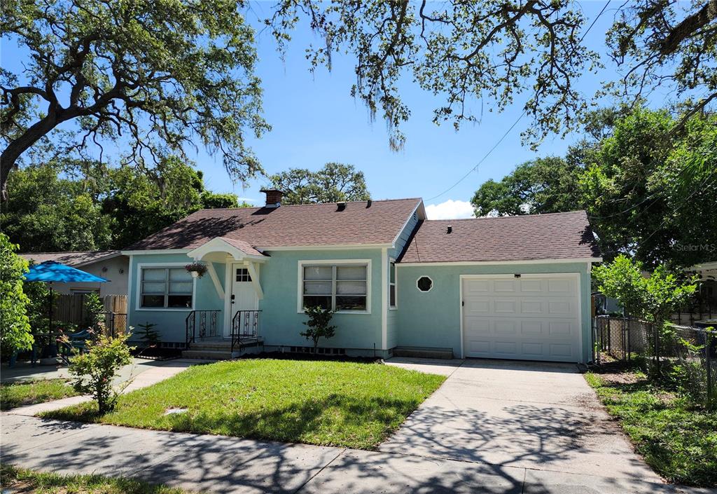 1925 Overbrook Avenue Clearwater, FL 33755 - Photo 1 of 1 front view of house with a yard